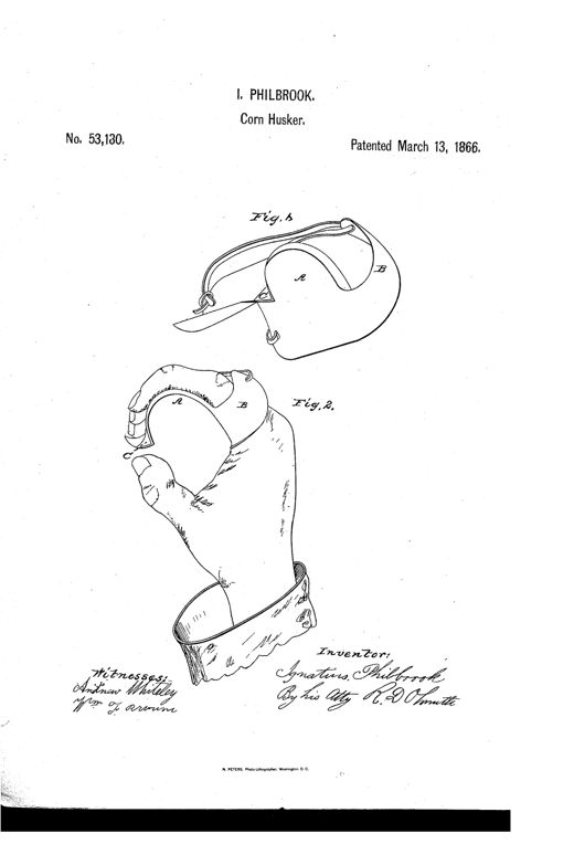 Patent drawing showing a curved metal hand plate with a hooked point and wing piece, shown both as a standalone device and fitted over a hand with fingers curled to grip an ear of corn.