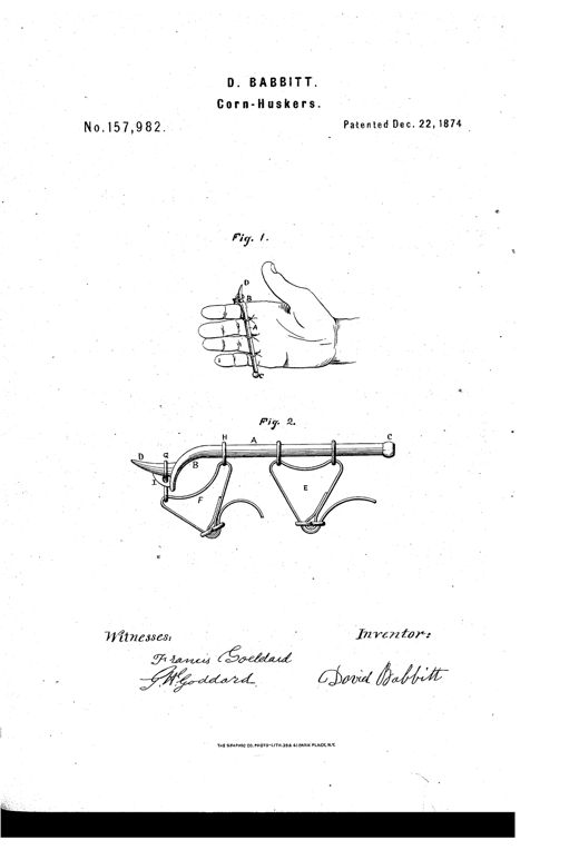 A patent drawing showing a metal husking peg with a curved bar and hook-like horn worn across the fingers of a hand, secured by straps and rings, with a separate plan-view diagram labeling the bar, curve, knob, horn, straps, and rings.